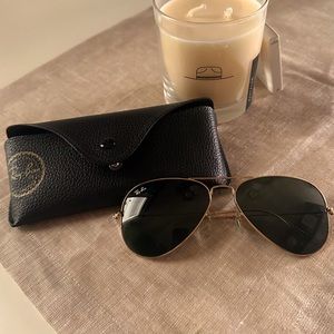 Ray-Ban aviator sunglasses; dark lenses
